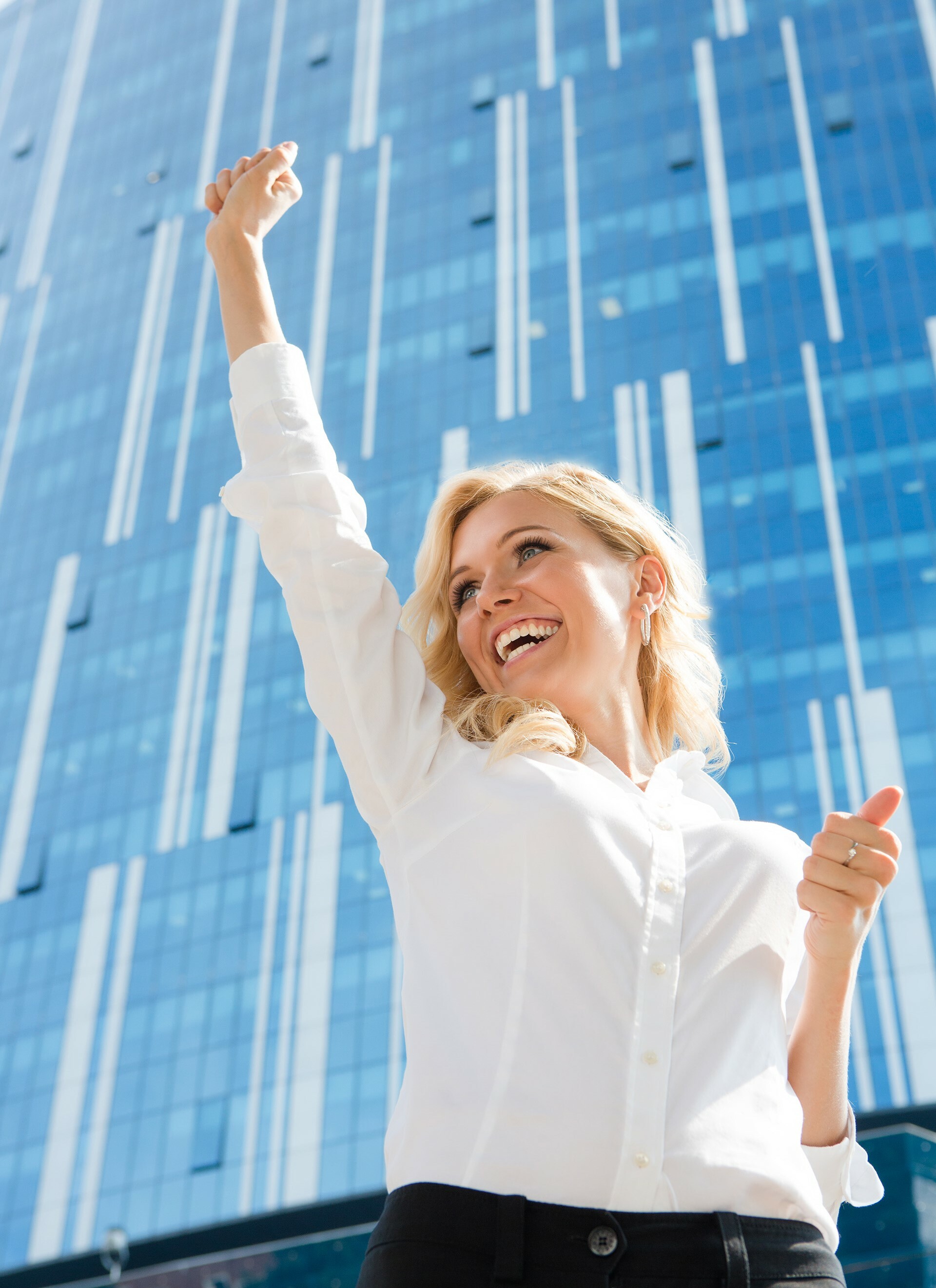 happy-businesswoman-is-winner-beautiful-lady-white-blouse-raised-her-hand-smiling-because-success305x8